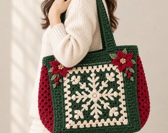 May include: A dark green crochet tote bag featuring a central cream-colored snowflake motif. The sides are made of a red open-weave granny square pattern. Two red poinsettia flowers with small wooden beads are attached to the top corners.