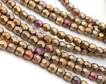 3mm Czech Glass beads. small faceted fire polished beads. color: Metallic Gold Iris Matte (1403F)