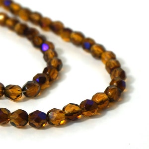 Faceted glass beads, 6mm amber yellow with blue iris finish, Czech Fire Polished Glass 836F image 1