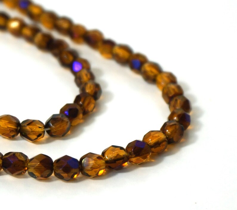 Faceted glass beads, 6mm amber yellow with blue iris finish, Czech Fire Polished Glass 836F image 1