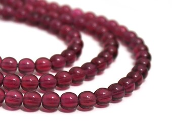 6mm round Czech Glass Beads, Transparent Fuschia, 11" bead strand, 50 beads  (1192G)