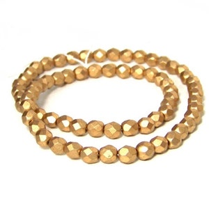 6mm Metallic gold glass beads, matte finish, faceted round 695G image 3
