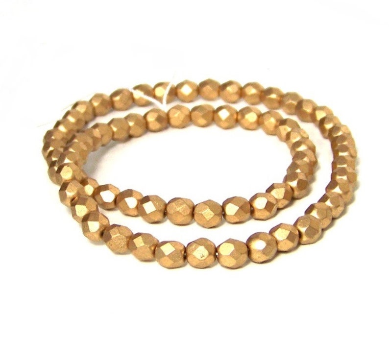 6mm Metallic gold glass beads, matte finish, faceted round 695G image 3