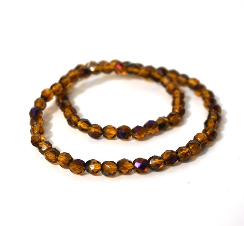 Faceted glass beads, 6mm amber yellow with blue iris finish, Czech Fire Polished Glass 836F image 2