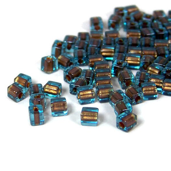 4mm glass beads, square blue with brown color lined hole, Miyuki cubes (432SB)