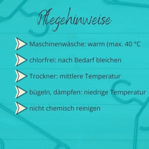 May include: A teal background with white text and care instructions in German. The text includes washing, bleaching, drying, ironing, and dry cleaning instructions. The text is in a handwritten font.
