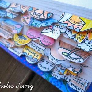 May include: A close-up of a book with colorful paper bookmarks. The bookmarks are labeled with names from the Bible, including Joshua, Isaiah, Malachi, Hosea, Zechariah, Baruch, and Sirach.