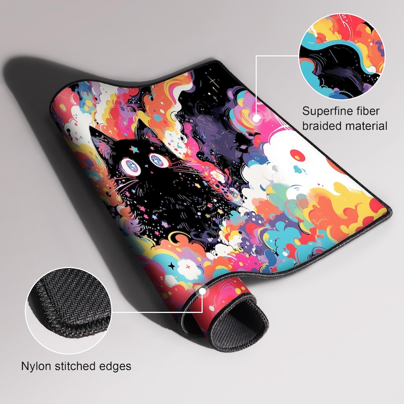 May include: A colorful mousepad featuring a black cat with large, round eyes against a vibrant background of swirling colors. The mousepad has nylon stitched edges and is made of superfine fiber braided material.