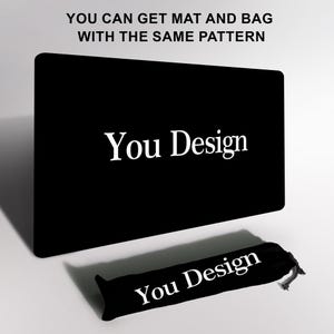 May include: A black rectangular mat and a matching black bag, both with the text "You Design" in white. The mat is larger and the bag is cylindrical with a drawstring closure. The text "You can get mat and bag with the same pattern" is at the top.