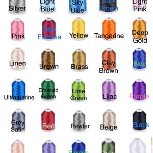May include: A collection of colorful embroidery thread spools, each labeled with a color name. Colors include silver, light blue, sky blue, dark brown, light pink, pink, dark fuchsia, yellow, tangerine, deep gold, linen, brown, brass, clay brown, blue, ultramarine, emerald green, lime green, lilac, purple, grey satin, red, pewter, beige, black, flesh pink, wisteria violet, electric blue, dark olive, and white.