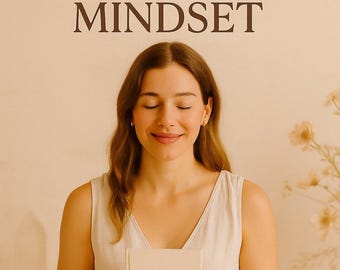 May include: A woman holding a book titled "Millionaire Mindset" with the text "ManifestwithIsa" above. The book has a floral design. The woman is wearing a light-colored top and has her eyes closed. The background is a soft beige.