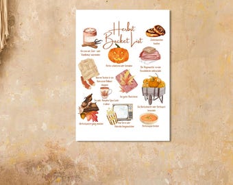 May include: A decorative poster with the text "Herbst Bucket List" and illustrations of fall-themed items. The poster includes images of a pumpkin, cinnamon rolls, and a cup of tea. The poster is displayed on a wall.