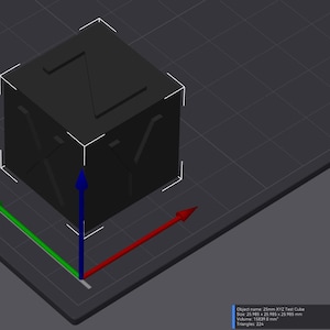 May include: A white ceramic mug with a black handle and the text "But First, Coffee" in a black, handwritten-style font. The mug is on a white surface.