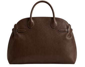 May include: A dark brown handbag with a smooth finish, featuring a rounded top silhouette, two sturdy top handles, and side strap details. The bag has a wide base and a clean, structured design with minimal hardware visible on the front exterior.