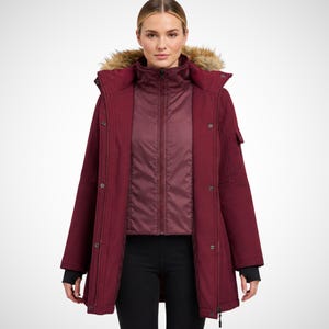 May include: A deep burgundy winter parka featuring a high collar, a full-length front zipper, and a snap-button placket. The hood is trimmed with brown faux fur. The jacket includes long sleeves with black ribbed cuffs and a small pocket on the arm.