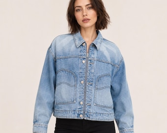 Cropped denim trucker jacket, button front jean coat and chest pockets, casual everyday outerwear, classic style luxury corporate gift