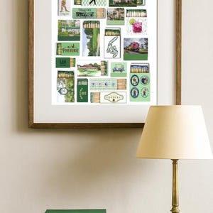 May include: A framed print featuring a collage of matchbox designs with golf-themed illustrations. The matchboxes showcase various green and white designs, including golf courses, golfers, and the text "PINEHURST". The print is displayed on a wall above a table.