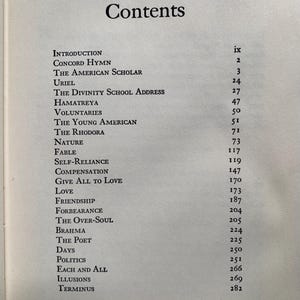 May include: A book's contents page with the title "Contents" in a large, bold font. The page lists chapter titles such as "Introduction," "Concord Hymn," and "The American Scholar," along with corresponding page numbers.