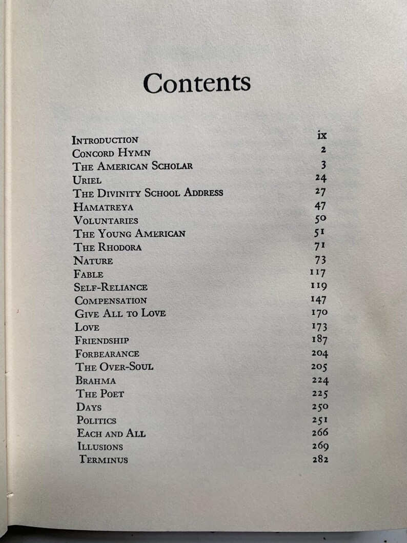 May include: A book's contents page with the title "Contents" in a large, bold font. The page lists chapter titles such as "Introduction," "Concord Hymn," and "The American Scholar," along with corresponding page numbers.