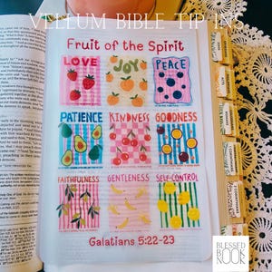 May include: A vellum Bible tip-in page featuring the Fruit of the Spirit with nine colorful illustrations. Each section displays a virtue like Love, Joy, Peace, Patience, Kindness, Goodness, Faithfulness, Gentleness, and Self-Control with fruit motifs.