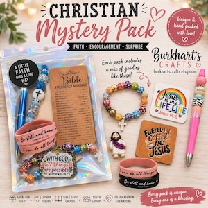 May include: A Christian mystery pack containing a holographic pouch with a blue beaded pen, a pink silicone bracelet, and a card with Bible emergency numbers. Outside are a multi-colored beaded bracelet, a Jesus figurine, a square coaster, and a pink pen.