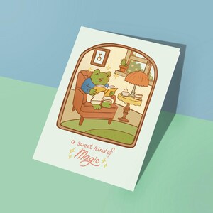 Tarjeta de felicitación con un dulce toque mágico, vibraciones hogareñas, descanso, relajación, lectura, café acogedor, día de ocio, magia, pensando en ti, descarga digital en blanco.