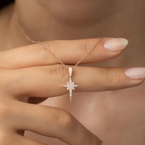 Sterling Silver Starburst Pendant Necklace: Rose-Tone Celestial Jewelry