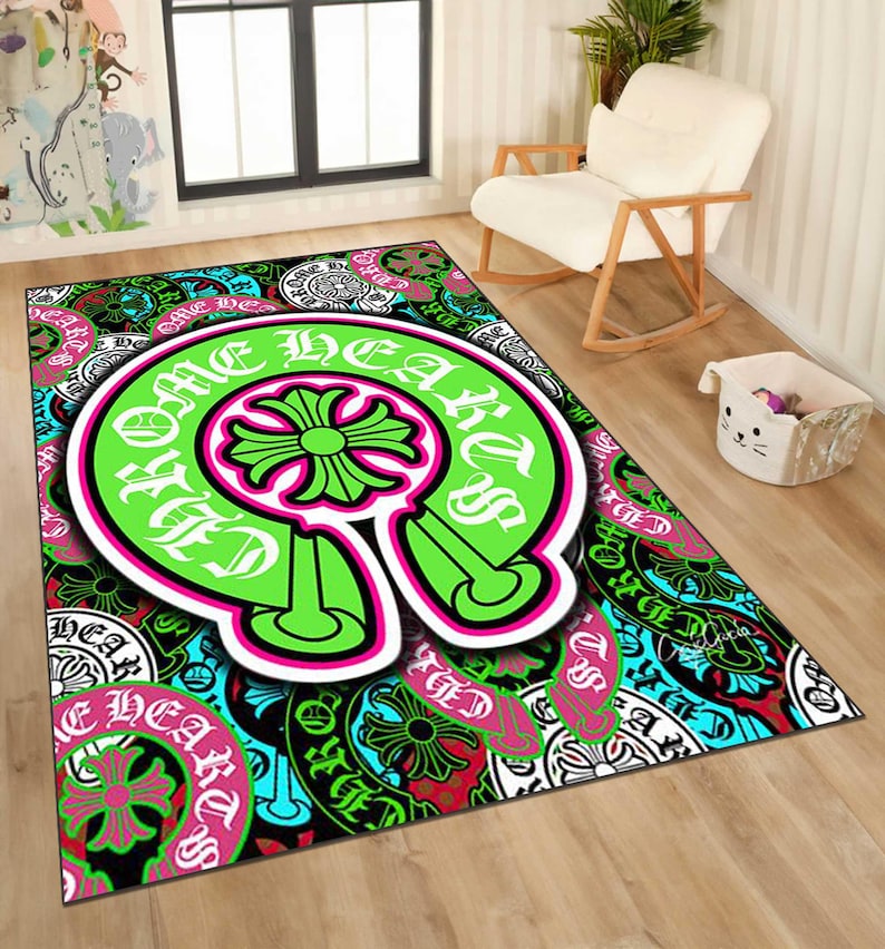 May include: A rectangular area rug with a vibrant, repeating pattern. The rug features a large, neon green horseshoe shape with the words "ONE HEARTED" in white. The background is a mix of black, teal, and pink designs.