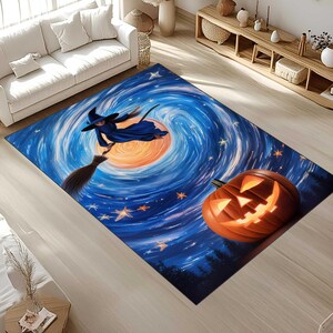 May include: A rectangular Halloween-themed rug featuring a witch flying on a broomstick against a swirling blue night sky with stars. A carved orange pumpkin with a glowing face is in the foreground. The rug's design evokes a whimsical, festive atmosphere.