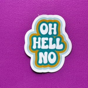 May include: A white sticker with the words "OH HELL NO" in teal, outlined in gold and light blue. The sticker has a rounded, cloud-like shape and is set against a purple background.