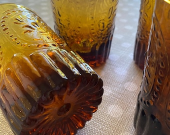 Anthropologie glass tumbler glasses in amber color