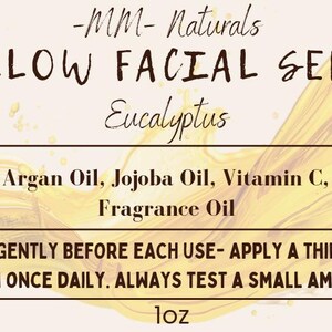 以下が含まれることがあります： 「-MM- Naturals」の「Tallow Facial Serum」のラベル。主要成分として「Eucalyptus」が記載されています。グリセリン、タロー、アルガンオイルなどの成分がリストされています。使用前に振って薄く塗布するよう指示。製品サイズは1オンスです。