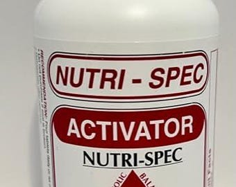 May include: A white bottle of Nutri-Spec Activator dietary supplement. The label features red and white text, including "Nutri-Spec," "Activator," and "Live Stronger Longer." The bottle contains 120 tablets.