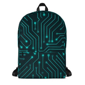 May include: Black backpack with a teal circuit board design. The backpack has a top handle, adjustable black shoulder straps, and a front pocket. The circuit board pattern features lines and circles, creating a tech-inspired aesthetic.