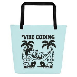 May include: Light blue tote bag with black handles featuring the text "VIBE CODING". The graphic shows a person relaxing in a hammock with a drink, palm trees, and two robots working on laptops.