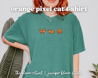 Pomarańczowa, przytulna koszulka z pikselowym kotem | przytulny prezent dla graczy