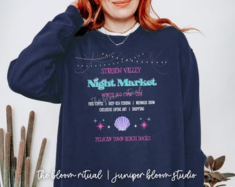 Przytulna bluza z okrągłym dekoltem Pelican Town Night Market | przytulny prezent dla graczy