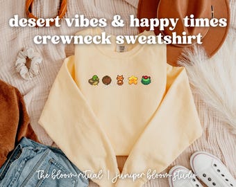 Przytulna bluza z okrągłym dekoltem w stylu pikselowym z motywem pustynnych wibracji i radosnych chwil | przytulny prezent dla graczy