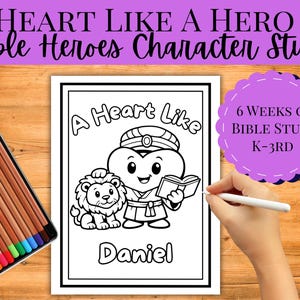 May include: A black and white coloring page with the text "A Heart Like Daniel" and an illustration of a heart-shaped character with a lion. A box of colored pencils is on the left. The text "HEART LIKE A HERO Bible Heroes Character Study" is at the top.