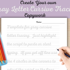 May include: A white sheet of paper with gray cursive tracing templates, pencils in a blue container, and the text "Create Your Own Gray Letter Cursive Tracing Copywork". A hand holds a pencil.
