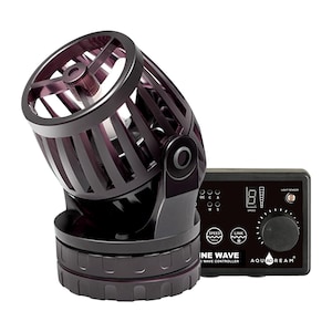 May include: A dark purple aquarium wave maker with a black control panel. The wave maker has a cage-like design and a rotating head. The control panel has a digital display and a speed control knob. The text "INE WAVE" and "AQUA DREAM" are visible.