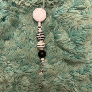 Black and white Badge Reel