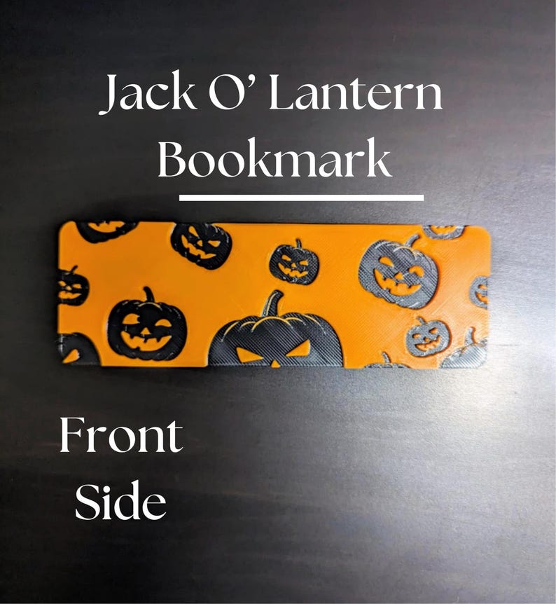 May include: Orange and black Jack O' Lantern bookmark. The bookmark features a repeating pattern of smiling pumpkin faces. The text "Jack O' Lantern Bookmark" is at the top of the image, with "Front Side" at the bottom.
