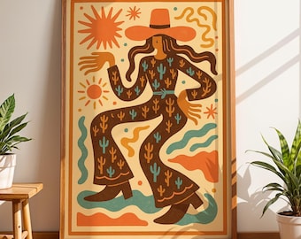 May include: A framed art print depicting a dancing figure in a hat and patterned clothing. The illustration uses warm tones of orange, brown, and teal, with sun and cactus designs. The print is displayed in a room with potted plants and a wooden stool.