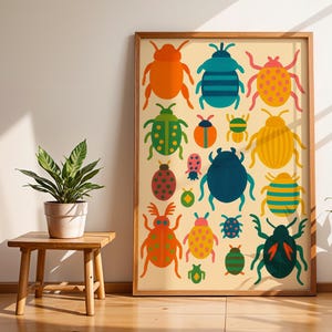 May include: A framed art print featuring a collection of colorful, stylized beetle illustrations. The insects are depicted in various sizes and colors, including orange, blue, green, and yellow, against a cream-colored background. The artwork is displayed in a room with plants.