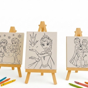 May include: Three small wooden easels each hold a canvas featuring black and white line drawings of characters from the animated film "Frozen." Crayons in various colors are scattered at the base of the easels, ready for coloring.