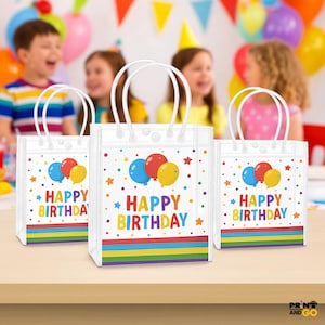 May include: Three white gift bags with white handles, each featuring a colorful "Happy Birthday" design. The design includes balloons, stars, and a rainbow stripe at the bottom. Children are in the background.