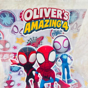 May include: A clear plastic bag containing stickers featuring Spider-Man characters. The stickers include Miles Morales, Spider-Man, Spider-Gwen, and a blue Spider-Man figure. The bag has the text "Oliver's Amazing 4" in red and yellow.