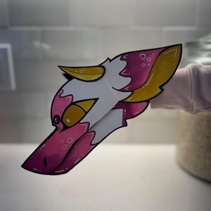 Frosting the Paper Dragon Puppet