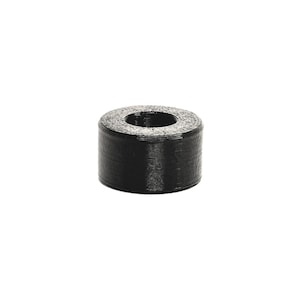 May include: A small, cylindrical black object with a hole in the center. The object has a textured surface and appears to be made of a solid material. The item is set against a white background.